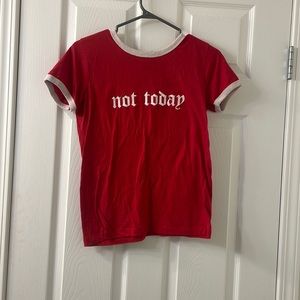 Red t shirt reads “not today”